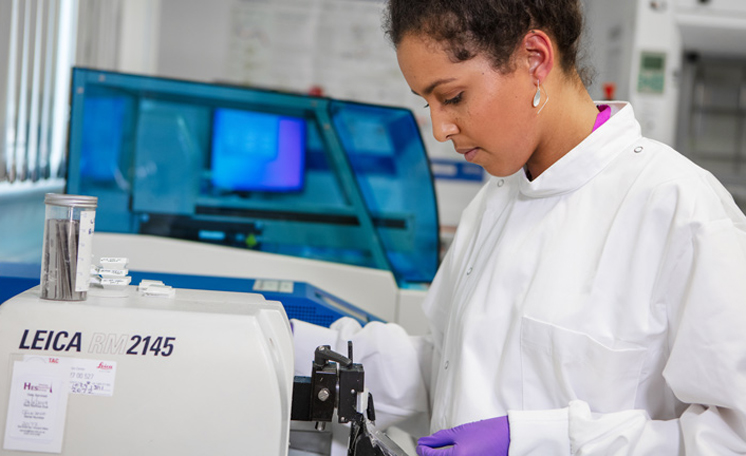 Student smiling at the camera